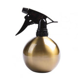 petit vaporisateur doré