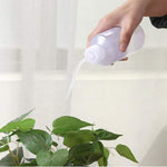 flacon souple d'arrosage plantes