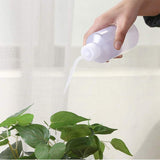 flacon souple d'arrosage plantes