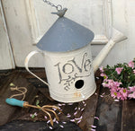arrosoir décoratif de jardin